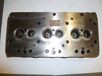 Головка блока цилиндров (без клапанов,шпилек)TDL 32 3L /Cylinder head